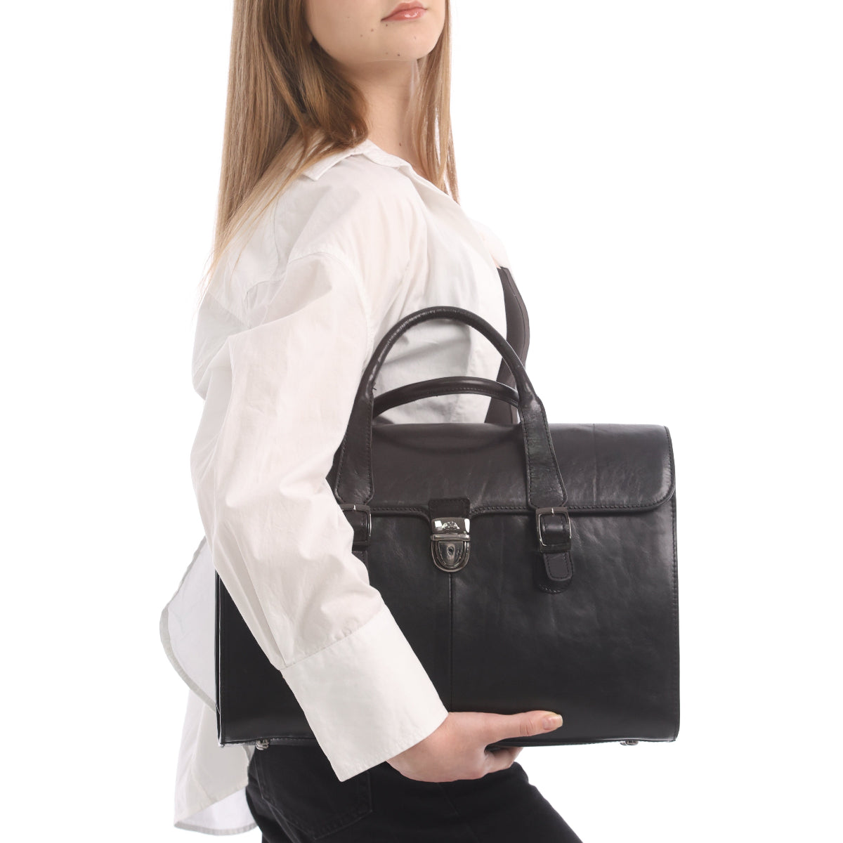 Three-quarter view of the black Tony Perotti Italico 8965 briefcase held at the side, silver centre lock in focus
