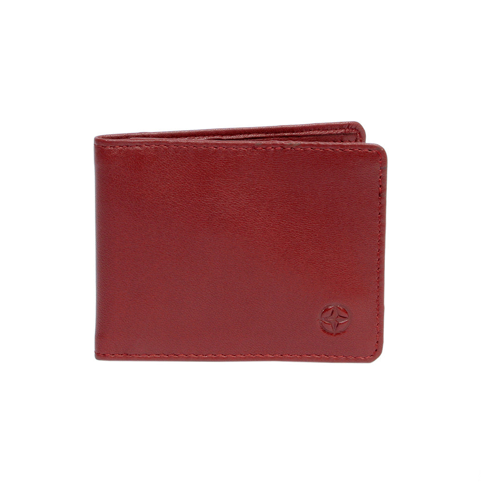 Closed Tony Perotti Cortina 5044 rosso red leather business card holder at an angle, with the embossed compass rose in the corner