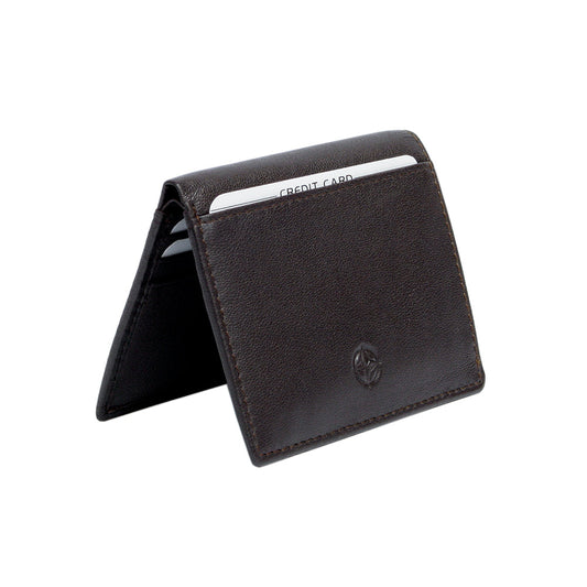 Tony Perotti Cortina 5045 moro dark brown leather card wallet standing half-open like a tent — cards in the slots on the inner panels and the compass rose on the front