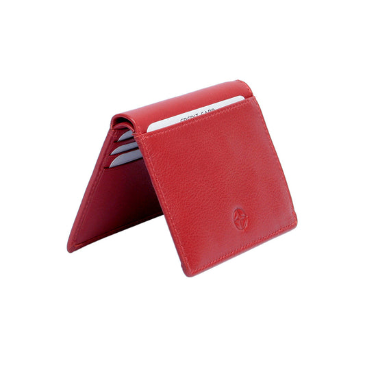 Tony Perotti Cortina 5045 rosso red leather card wallet standing half-open like a tent — cards in the slots on the inner panels and the compass rose on the front