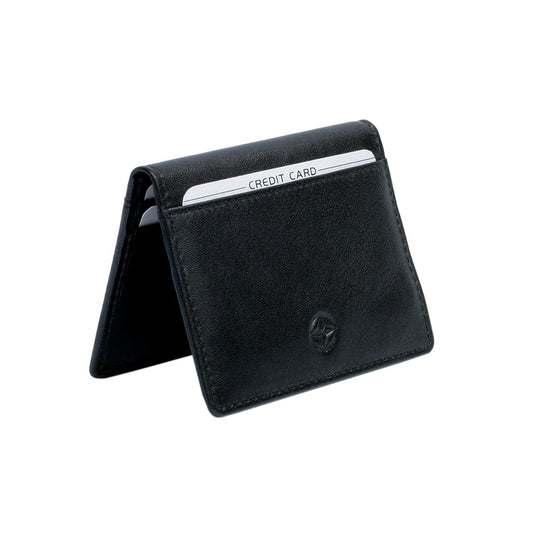 Tony Perotti Cortina 5046 nero black leather card wallet standing half-open like a tent — a card in the outer front pocket and the compass rose on the front