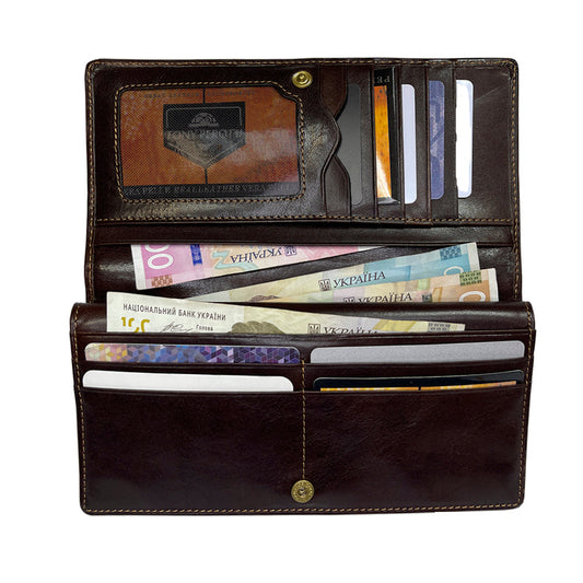Tony Perotti Brown Leather Card Wallet with Flap with currency and cards on a white background