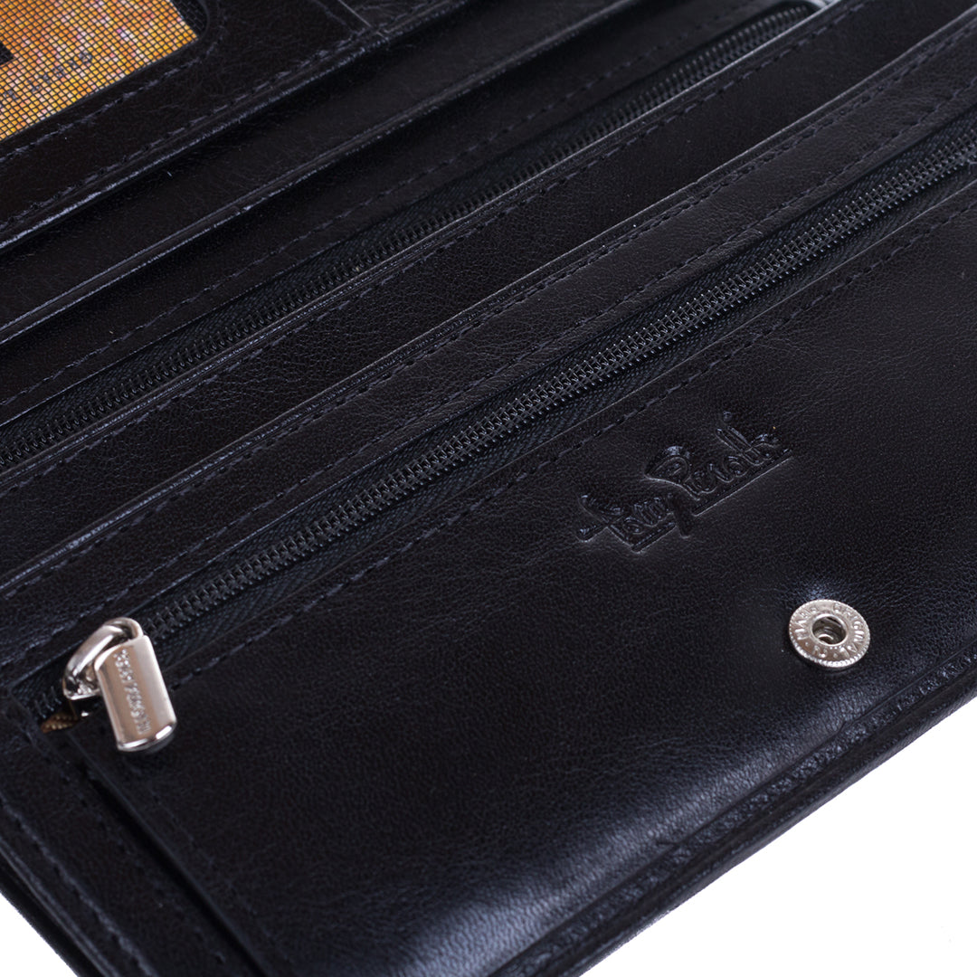 Close-up inside the Tony Perotti Italico 2770+RFID nero wallet — embossed Tony Perotti signature, branded silver zip puller and snap fastener