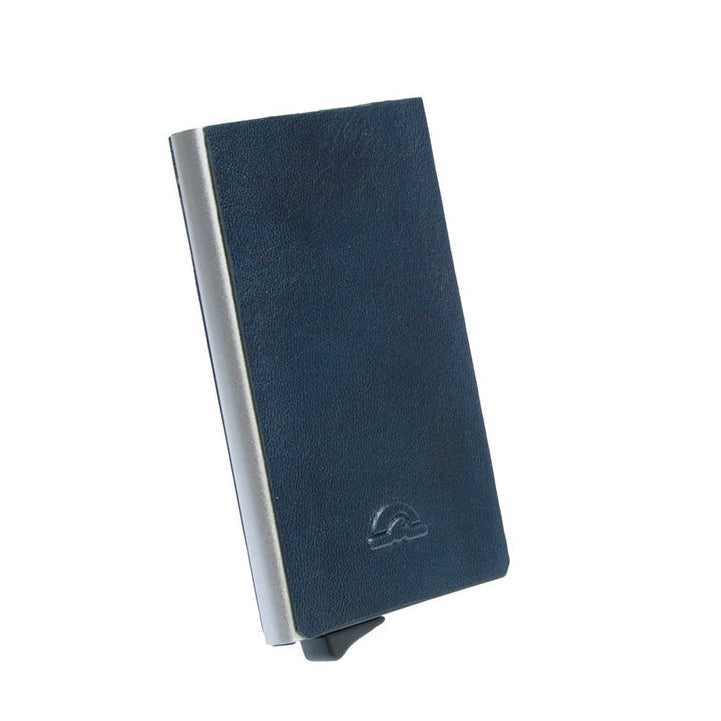 The navy Nevada 3771 at an angle — the brushed aluminium edge, the thumb lever at the base and the embossed Tony Perotti emblem