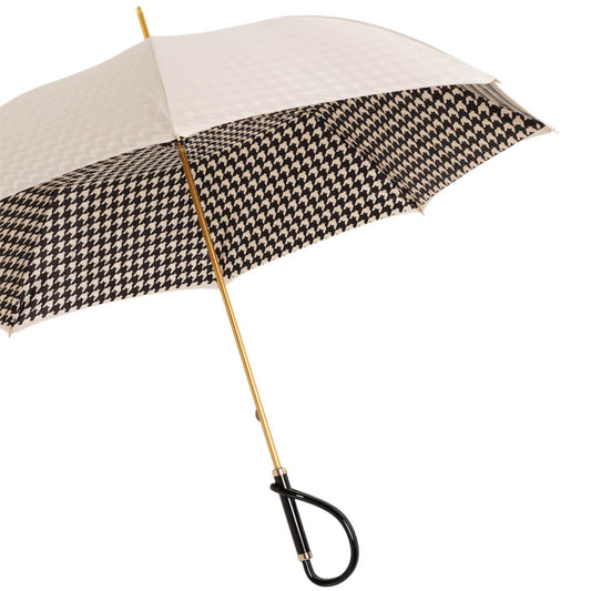 Open Pasotti ivory umbrella showing classic goose-foot style pattern