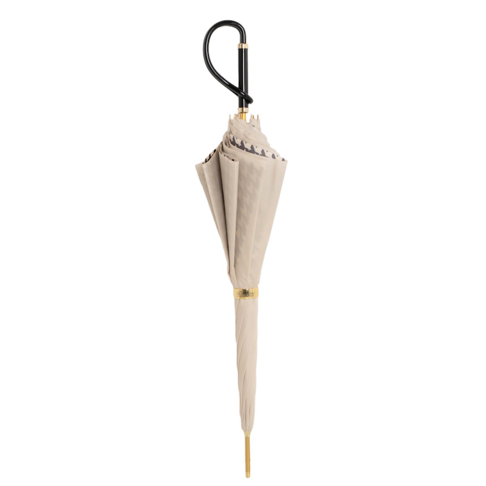 Closed Pasotti ivory cane umbrella with elegant full-size silhouette