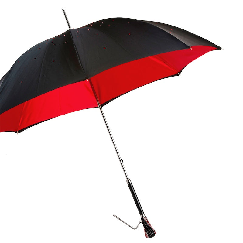 Red Swarovski crystals sewn onto black Pasotti umbrella canopy