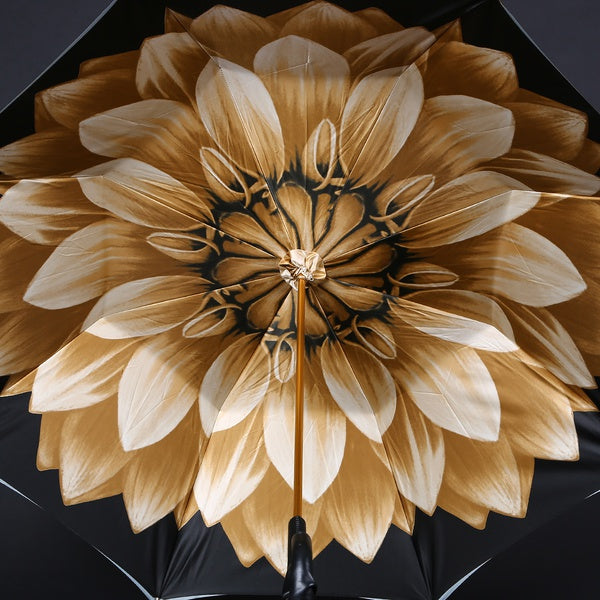 Pasotti bronze-brown cane umbrella with dahlia print under canopy