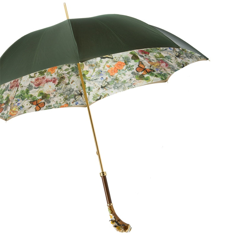 Pasotti umbrella with floral patterned canopy and decorative handle on a white background