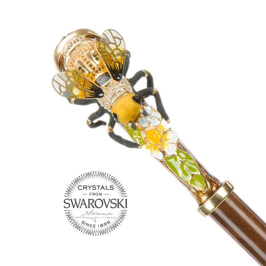 Decorative handle with bee design and Swarovski crystals on a white background