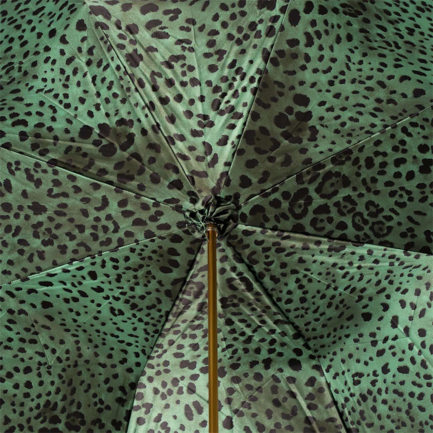 Interior view of green leopard print canopy, close-up detail