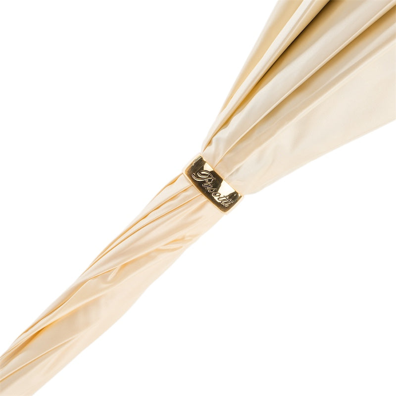 Closed Pasotti cream leopard cane umbrella with crystal handle
