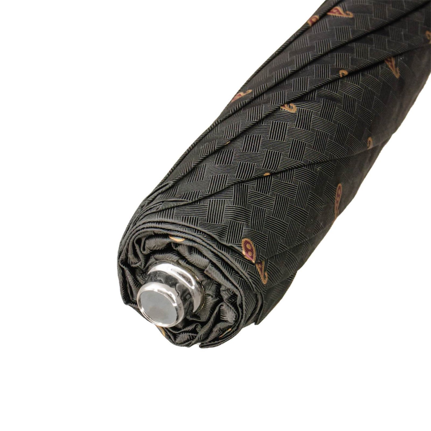 Rolled canopy detail of Pasotti men’s folding umbrella with paisley design