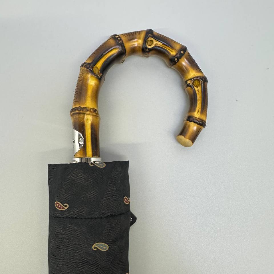 Folding Pasotti umbrella in fabric sleeve with paisley pattern and bamboo handle