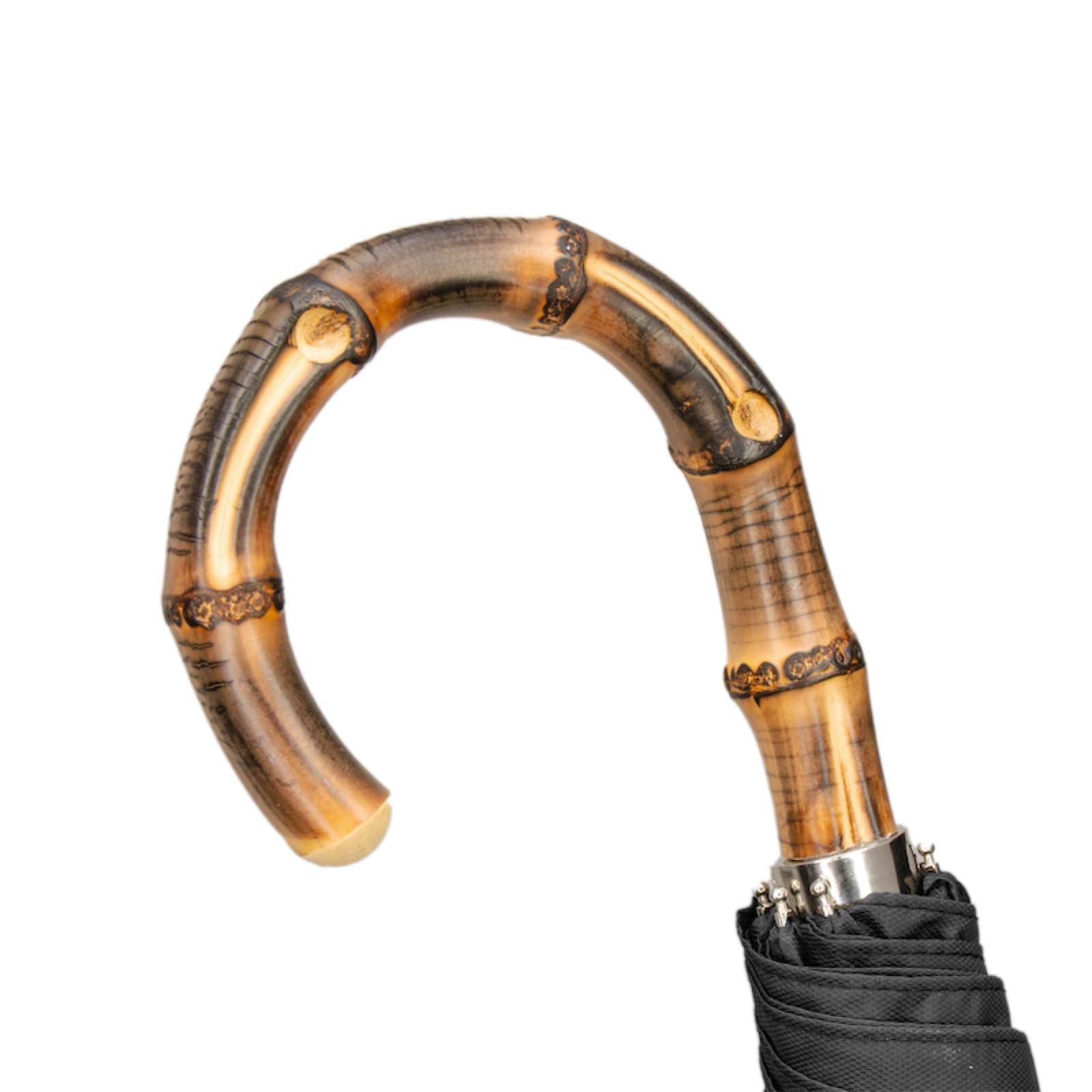 Natural bamboo handle detail of Pasotti men’s folding umbrella