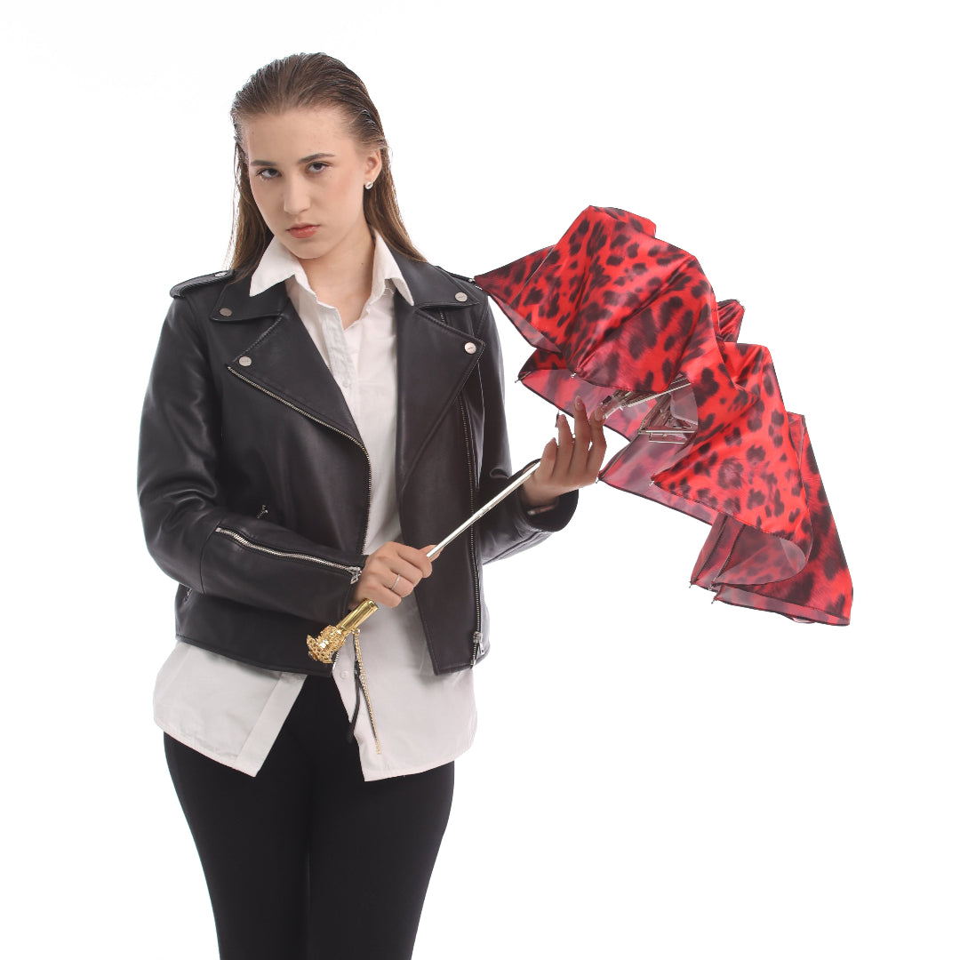 Pasotti folding umbrella carried by model, style presentation