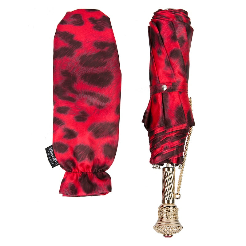 Folded Pasotti red leopard print umbrella, compact view
