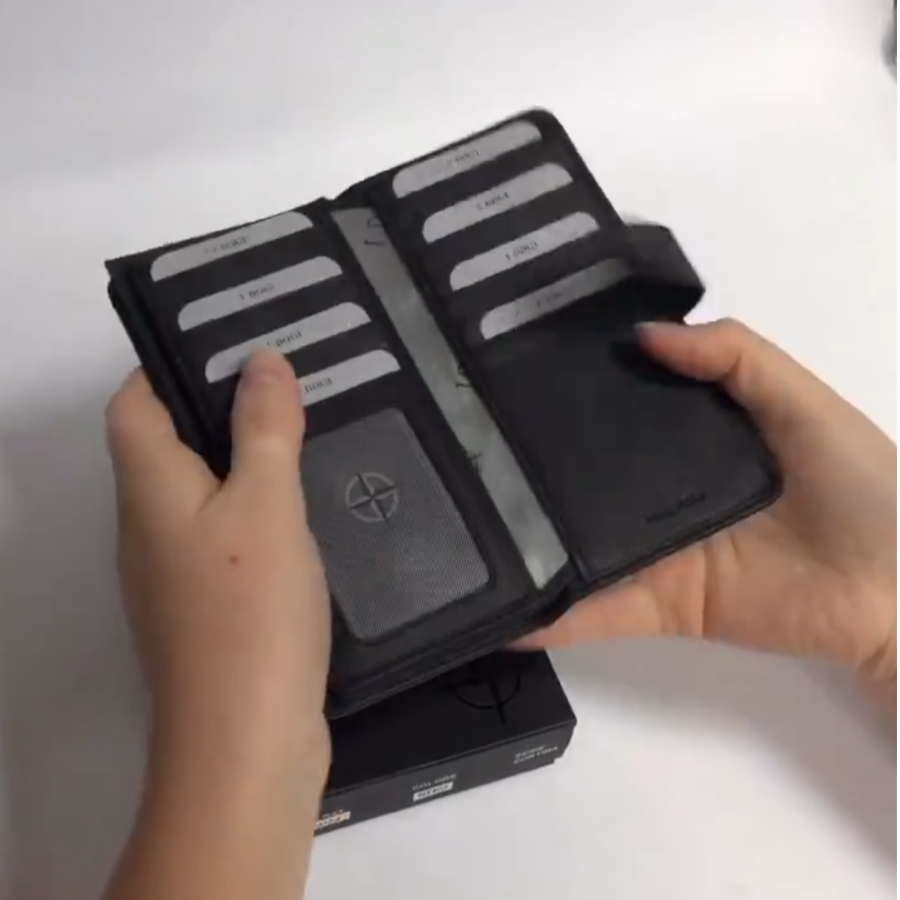 Black Cortina 5074 card wallet held in hand showing the card capacity