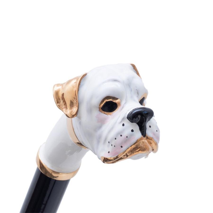 Boxer head with a black nose and gold-tone details above the black shaft, handcrafted in Italy