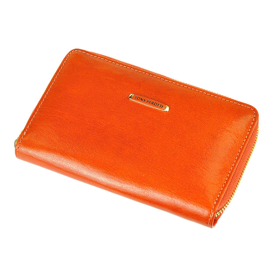 Tony Perotti Topkapi 3441 mandarino wallet — vegetable-tanned Tuscan cowhide at an angle