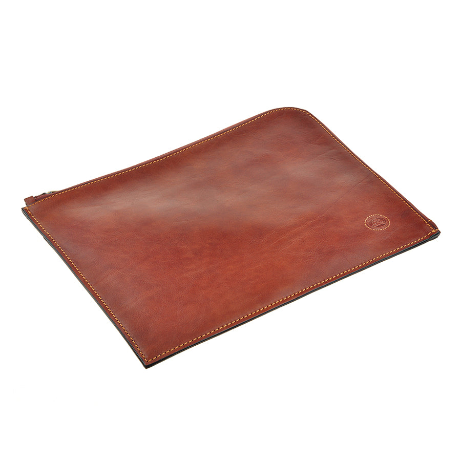 Cognac Italico 8017L lying flat — glossy leather and the turtle emblem in the corner