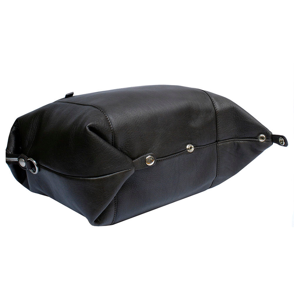 Tony Perotti Contatto 9217-31 moro dark brown leather handbag seen from below with the base snaps fastened — the rounded compact shape