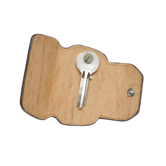 Tony Perotti Nevada KR-199 cognac — opened flat: natural undyed leather inside and a key bolted to the screw post in the middle