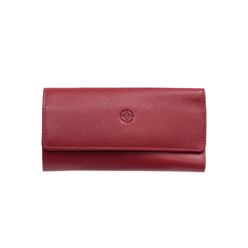 Tony Perotti Cortina 5022 rosso — red leather trifold key case closed, compass-rose emblem embossed on the flap