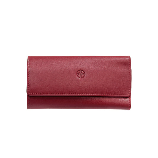 Tony Perotti Cortina 5022 rosso — red leather trifold key case closed, compass-rose emblem embossed on the flap