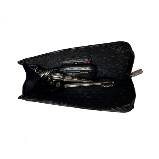 Tony Perotti Swarovski 1941L nero — the case unzipped flat with keys inside, showing the signature-print lining