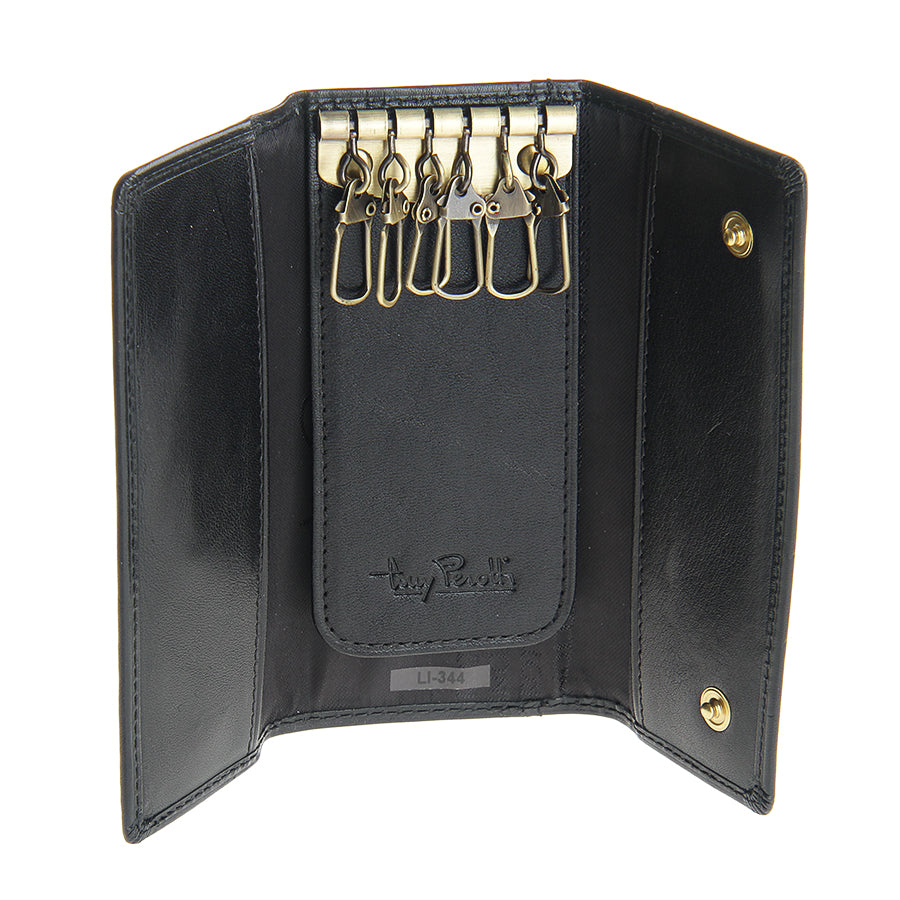 Black leather key case open with six swivel key hooks and embossed Tony Perotti signature — Italico 344 nero