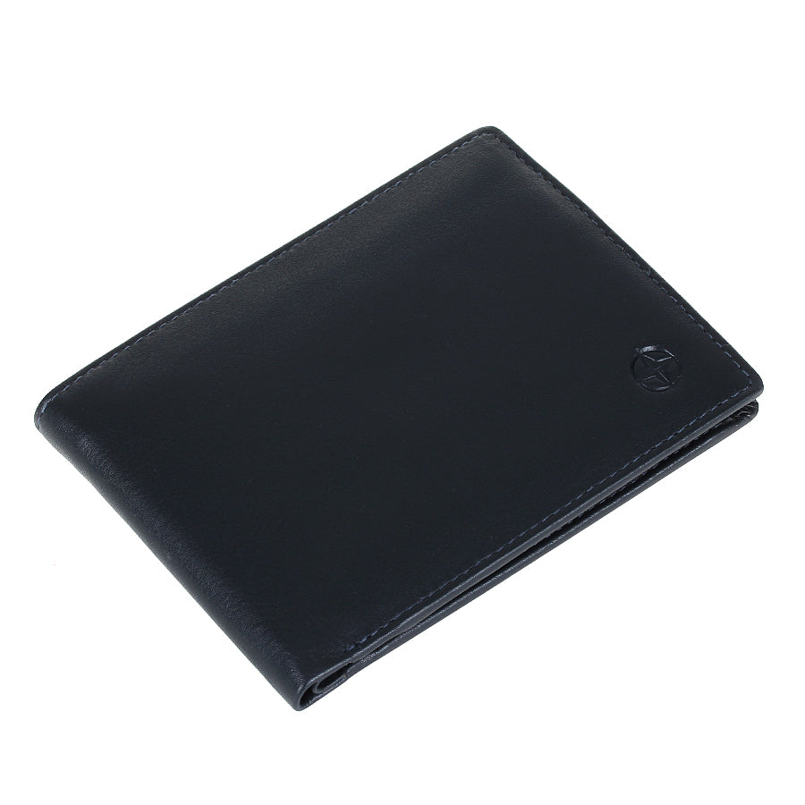 Navy Tony Perotti Cortina 5013 wallet lying closed, seen from above — the fold and the slim profile