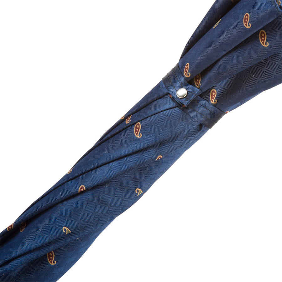 Fabric strap with silver-tone snap button on the furled paisley canopy