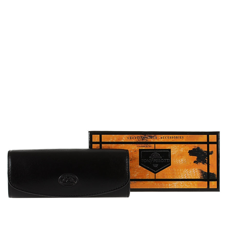 Black leather glasses case Tony Perotti Italico 1290 nero next to its branded gift box