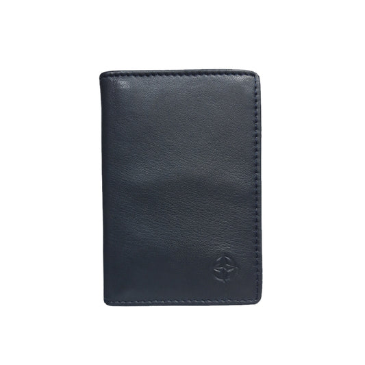 Tony Perotti Cortina 5004 navy — the navy leather business card holder closed, with the embossed compass rose on the front