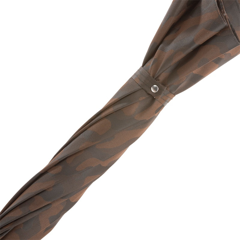 Furled camouflage canopy with matching strap and silver-tone snap button
