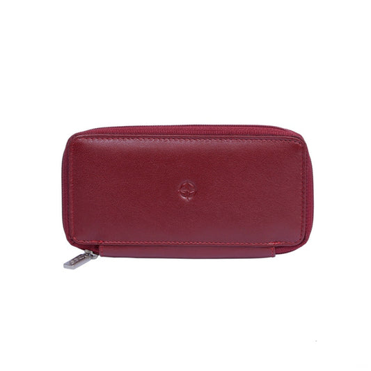 Tony Perotti Cortina 5026 rosso — red leather zip-around key case closed, compass-rose emblem embossed on the front