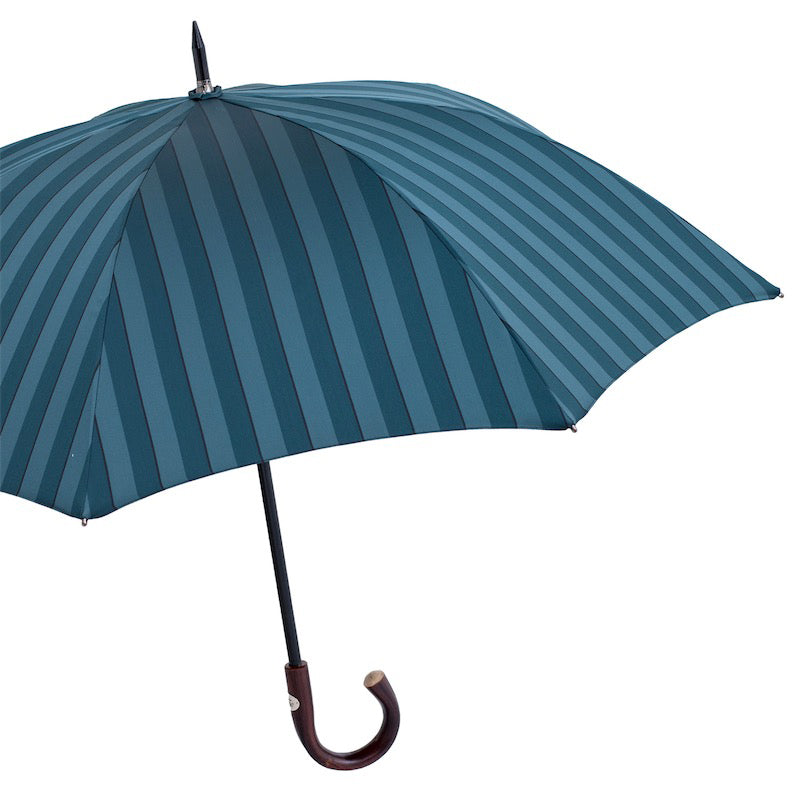 Open striped umbrella from the side with black shaft and dark chestnut crook handle