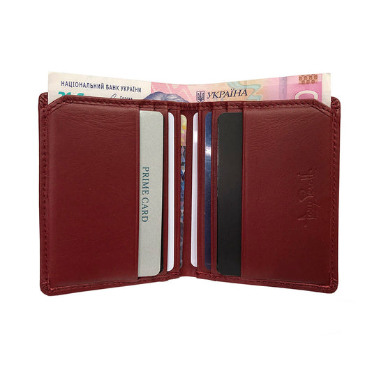 Tony Perotti New Rainbow 1034 rosso — opened out with cards in the slots on both halves and a banknote between them