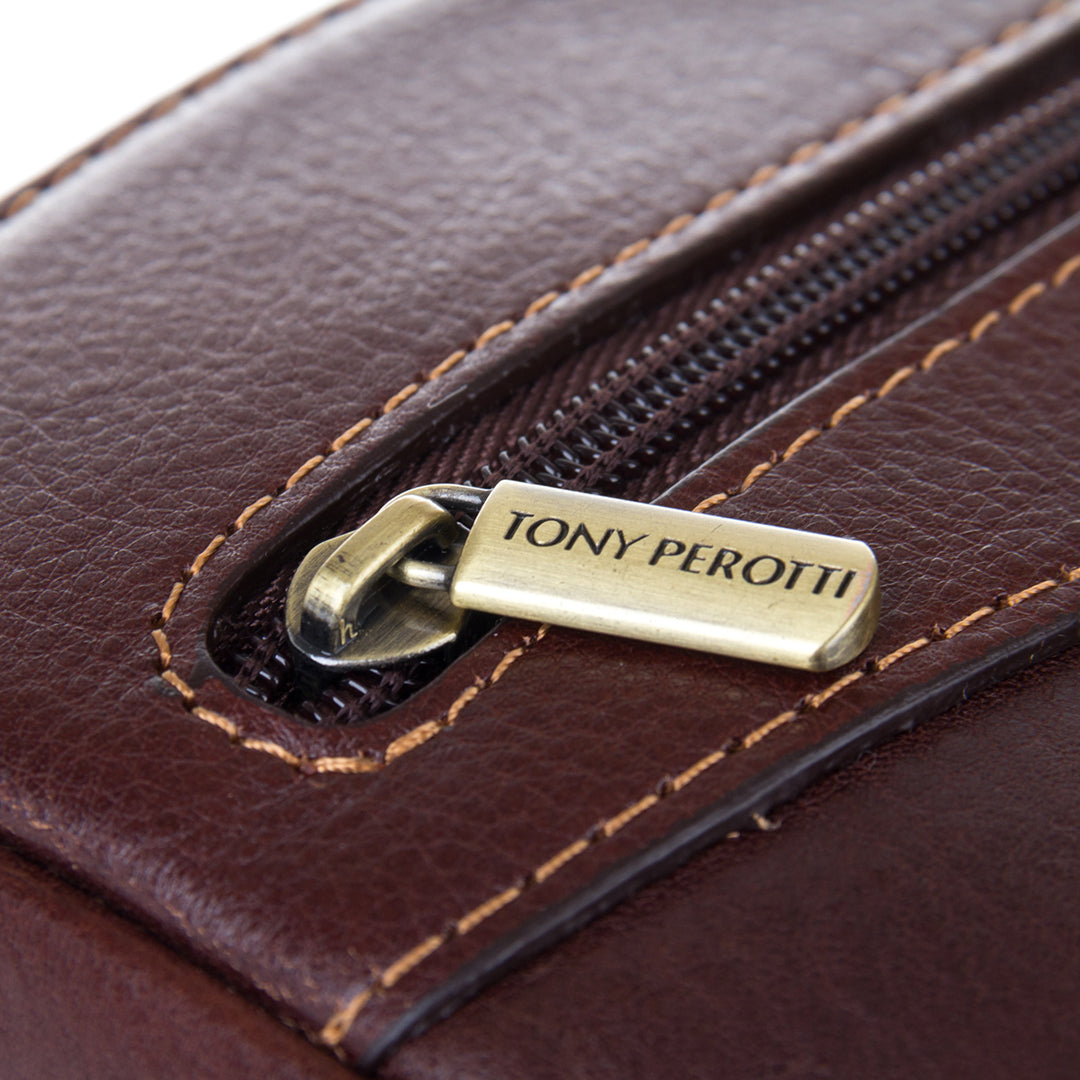Close-up of the antique brass Tony Perotti zip puller on the dark brown Italico 9137-20
