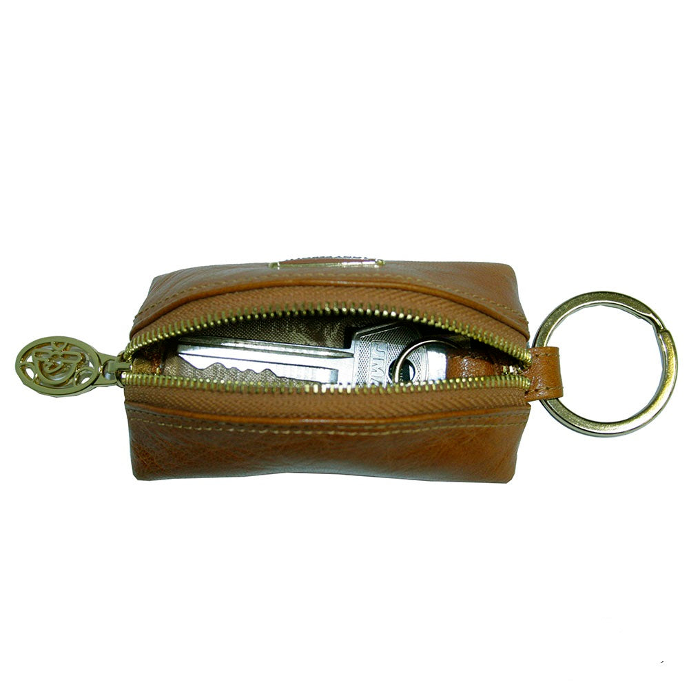 Tony Perotti Topkapi KR-186 giallo — the case unzipped with a car key and fob inside, showing the light grey lining and the split ring on its leather tab