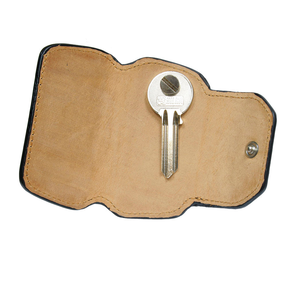 Tony Perotti Nevada KR-199 navy — opened flat: natural undyed leather inside and a key bolted to the screw post in the middle