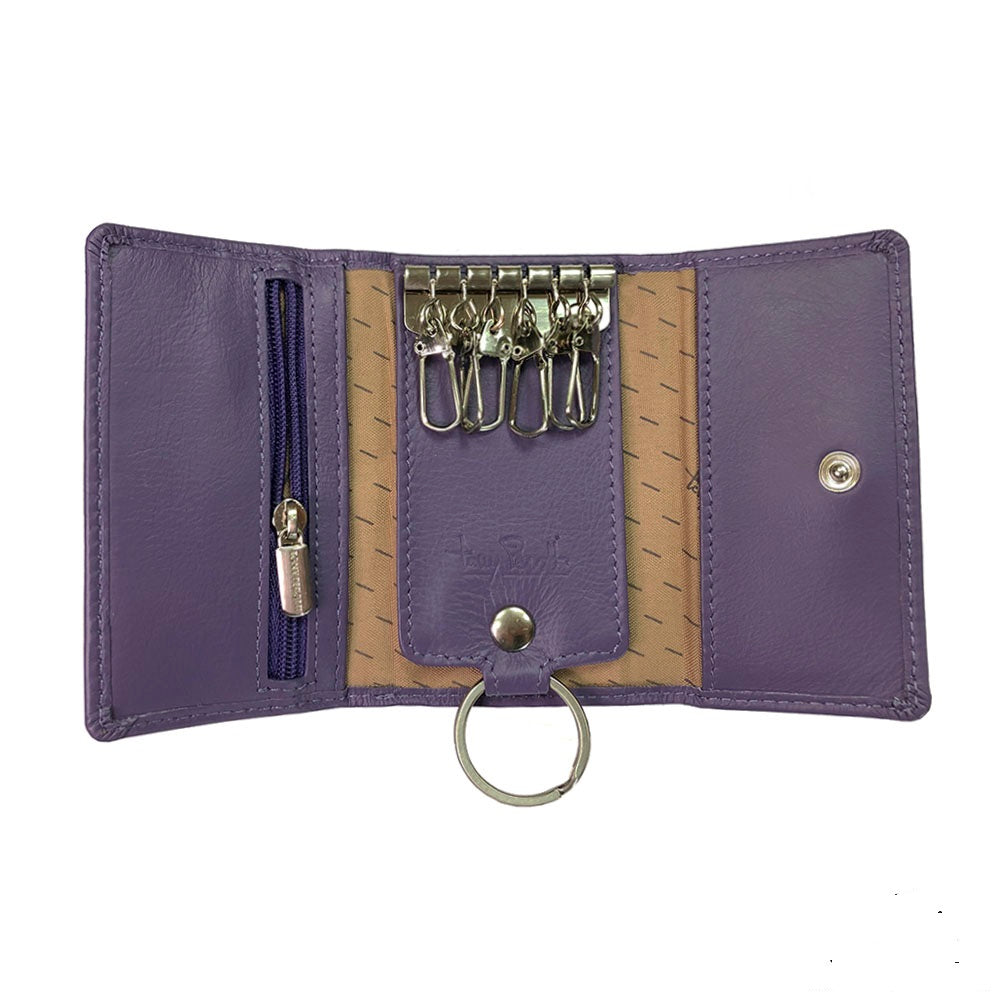 Tony Perotti New Rainbow 1117 viola — opened flat: the six empty hooks, the card slots behind the side panels and the ring on its leather tab