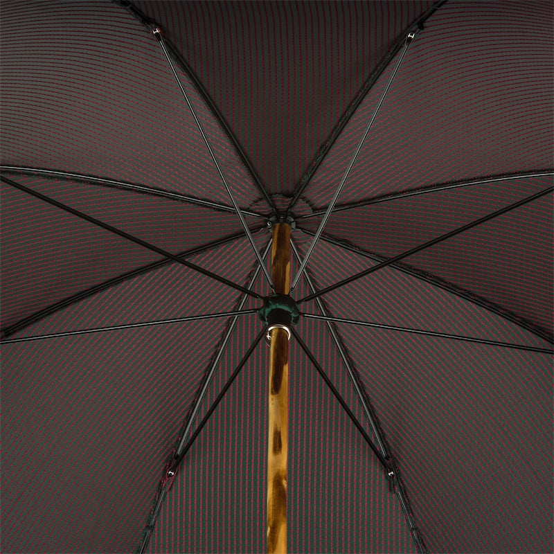Underside of the canopy: striped weave, eight ribs and natural wood shaft