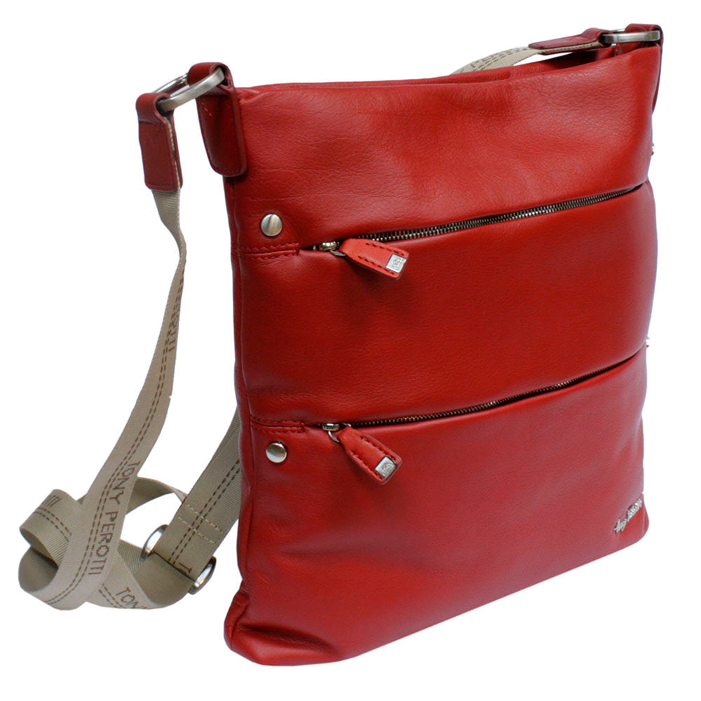 Tony Perotti Contatto 9579-28 rosso red leather crossbody bag at an angle with its strap — webbing woven with the Tony Perotti name, leather ends and silver fittings