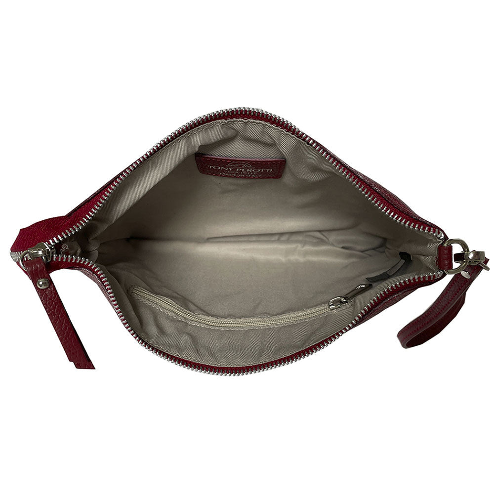 Inside the Borsa CA046 — pale textile lining with a zip pocket and the stitched Tony Perotti Made in Italy label