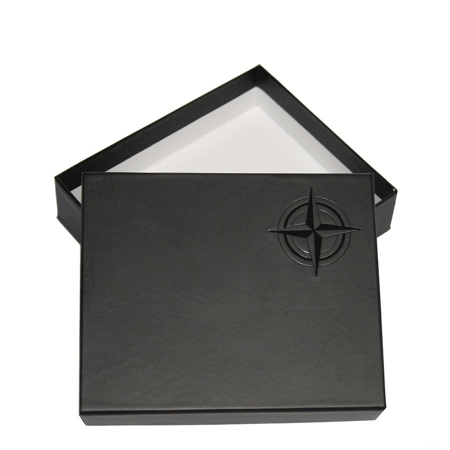 Black box with a star emblem on a white background