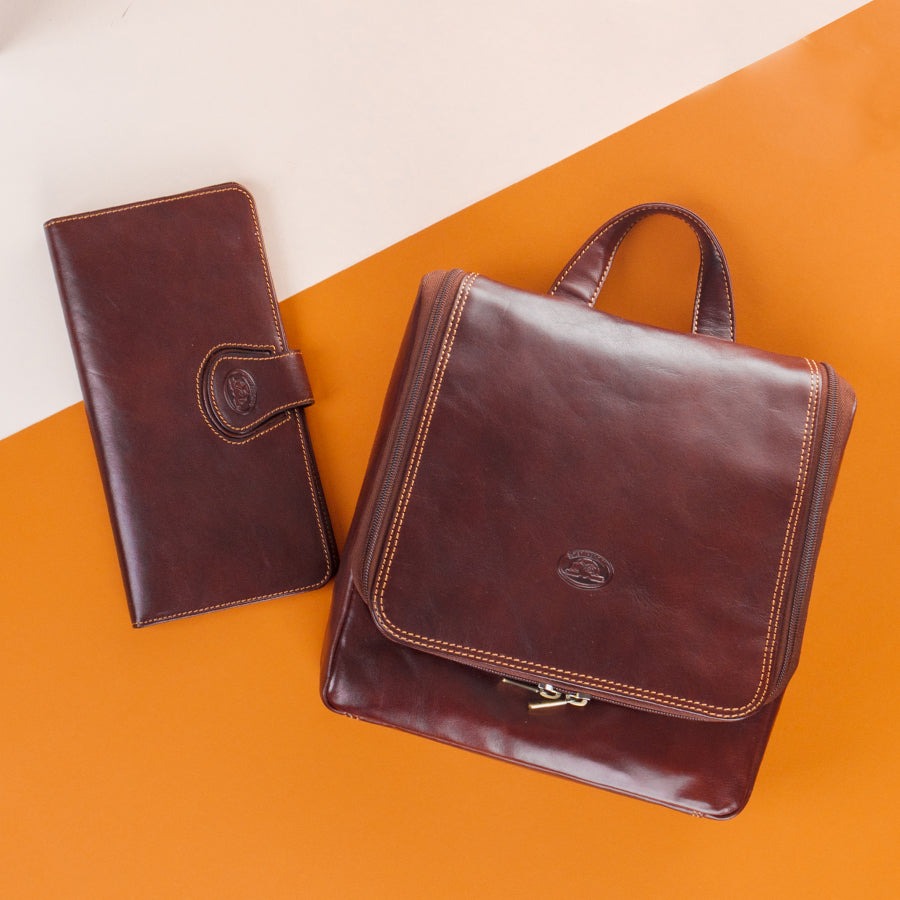 Tony Perotti Italico 8220 moro brown leather toiletry bag styled with matching leather travel accessory
