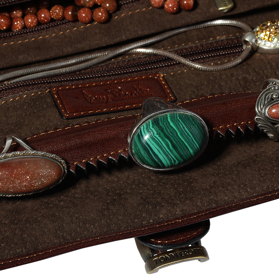 Close-up of the notched ring roll and the embossed Tony Perotti label inside the Italico 1286 moro jewelry case