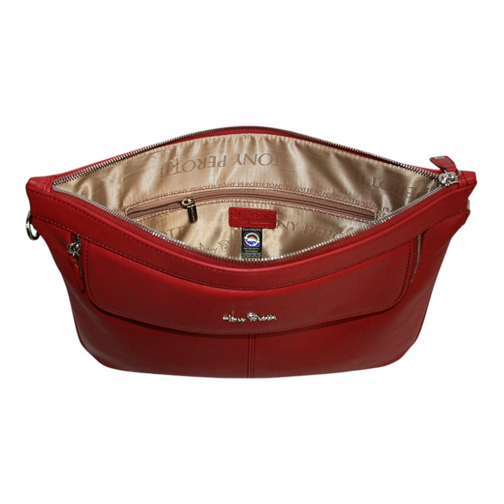 Inside the Tony Perotti Contatto 9708 rosso portfolio — zip pocket, embossed leather label and security hologram tag